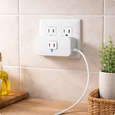 EvokLiving smart plug US version plugged into wall socket, compact design for remote control of connected devices