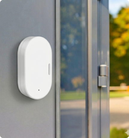 EvokLiving door and window sensor showing installed sensor device on a door frame for security detection