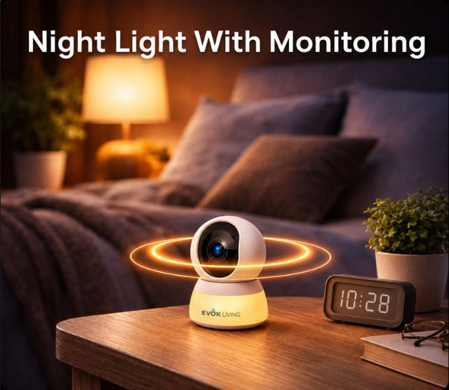Wireless indoor baby monitor camera by EvokLiving showing a baby sleeping in a crib with a clear view of the monitor screen.