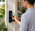 EvokLiving Smart Door Lock T250 with PIN and fingerprint access showing a sleek black lock with keypad and fingerprint scanner.